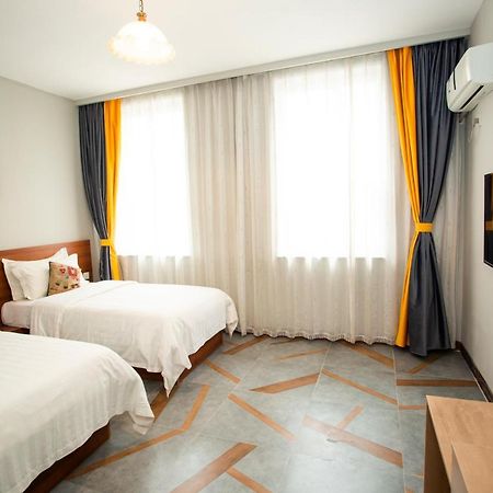 Ou Lu Business Hotel Циндао Экстерьер фото