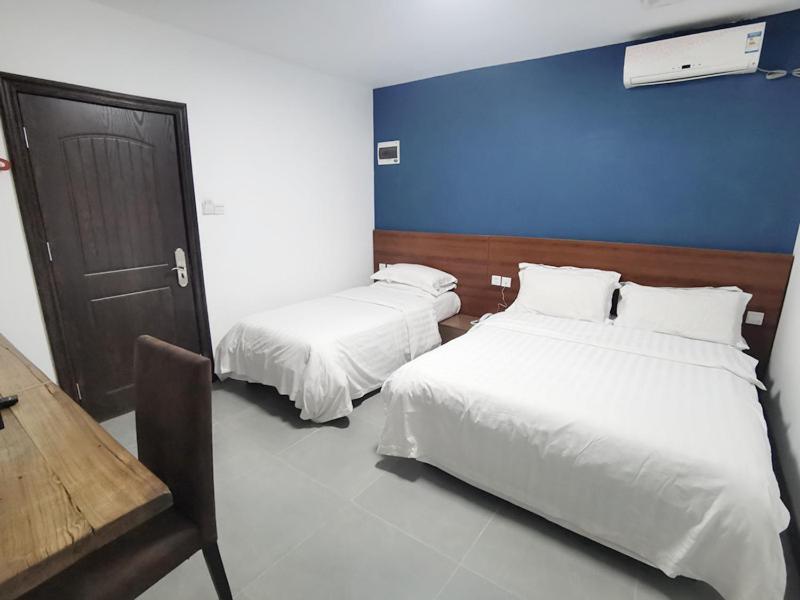 Ou Lu Business Hotel Циндао Экстерьер фото