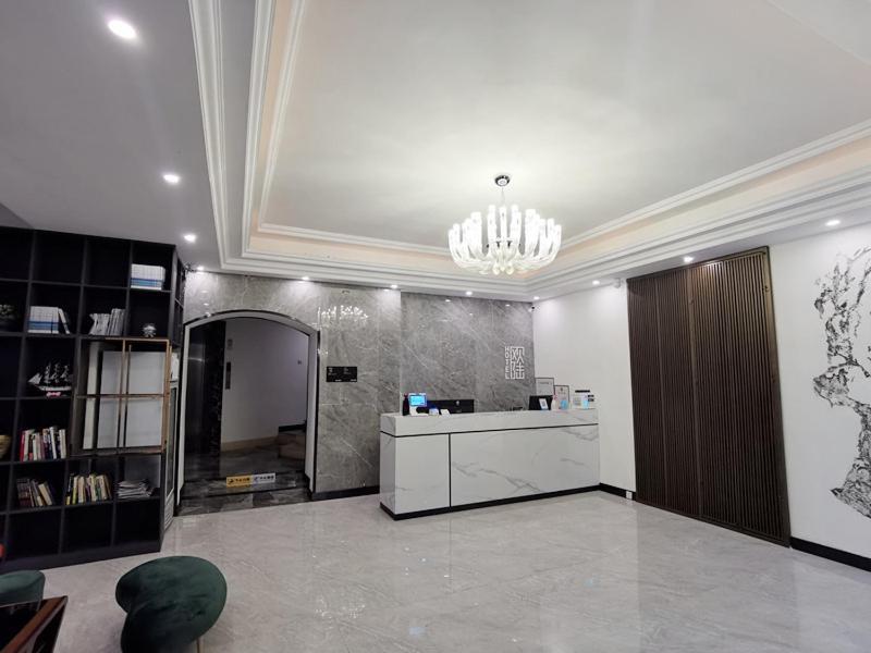 Ou Lu Business Hotel Циндао Экстерьер фото