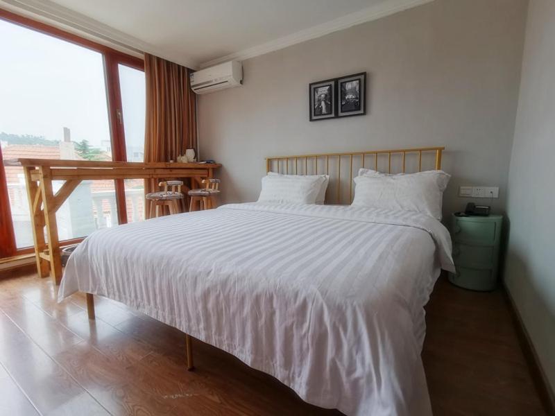 Ou Lu Business Hotel Циндао Экстерьер фото